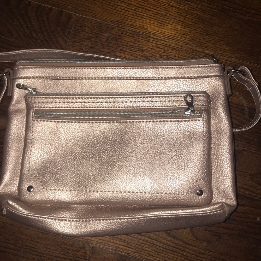 Relic cross body purse. Metallic pink.